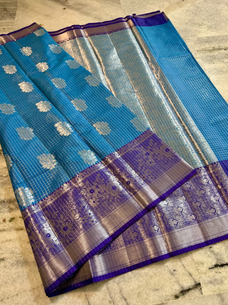 Sky Blue Banarasi Silk Saree with Purple Border & Silver Zari Floral Weaving