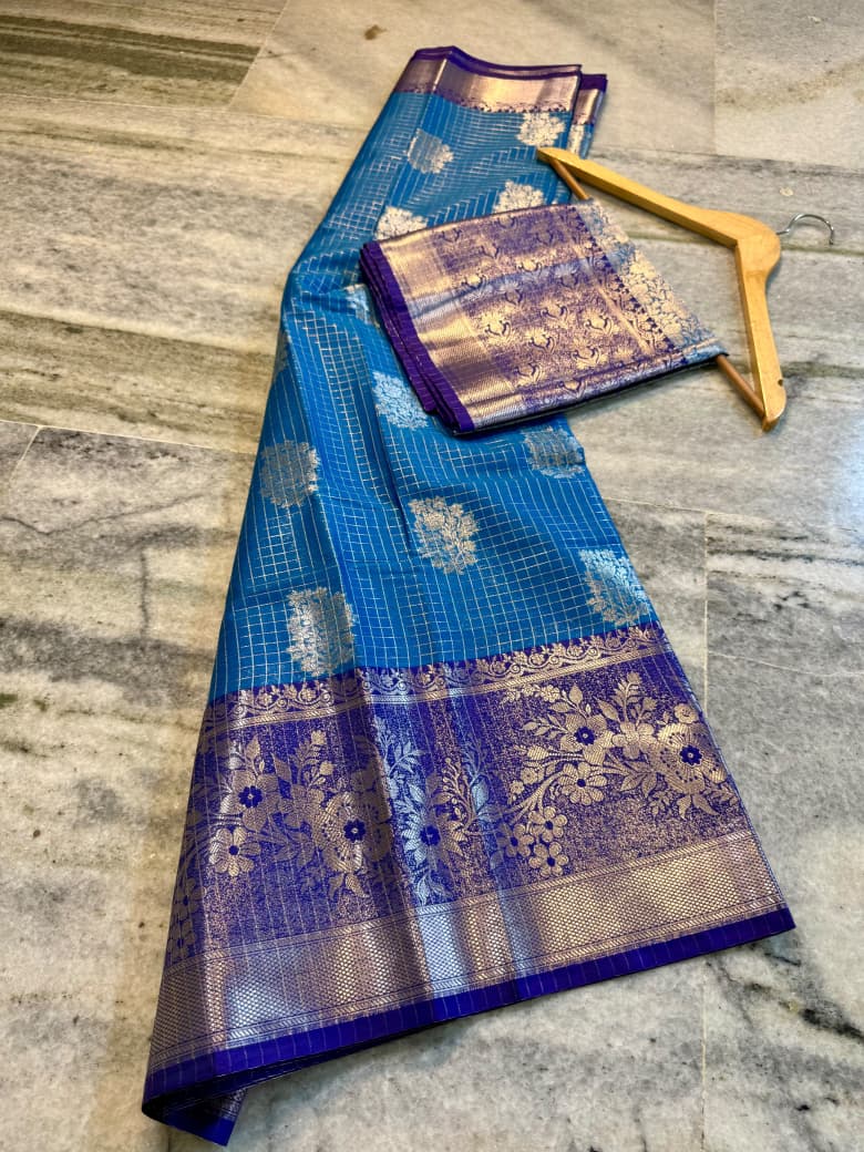 Sky Blue Banarasi Silk Saree with Purple Border & Silver Zari Floral Weaving
