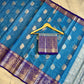 Sky Blue Banarasi Silk Saree with Purple Border & Silver Zari Floral Weaving