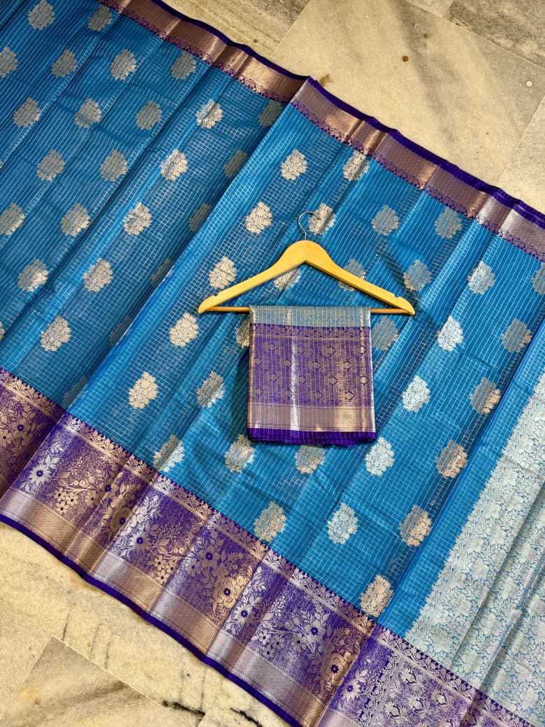 Sky Blue Banarasi Silk Saree with Purple Border & Silver Zari Floral Weaving