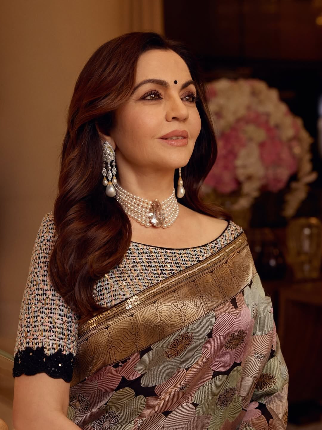 Black Nita Ambani Inspired Mashru Silk Saree with Multicolor Floral Weaving & Antique Gold Zari Border