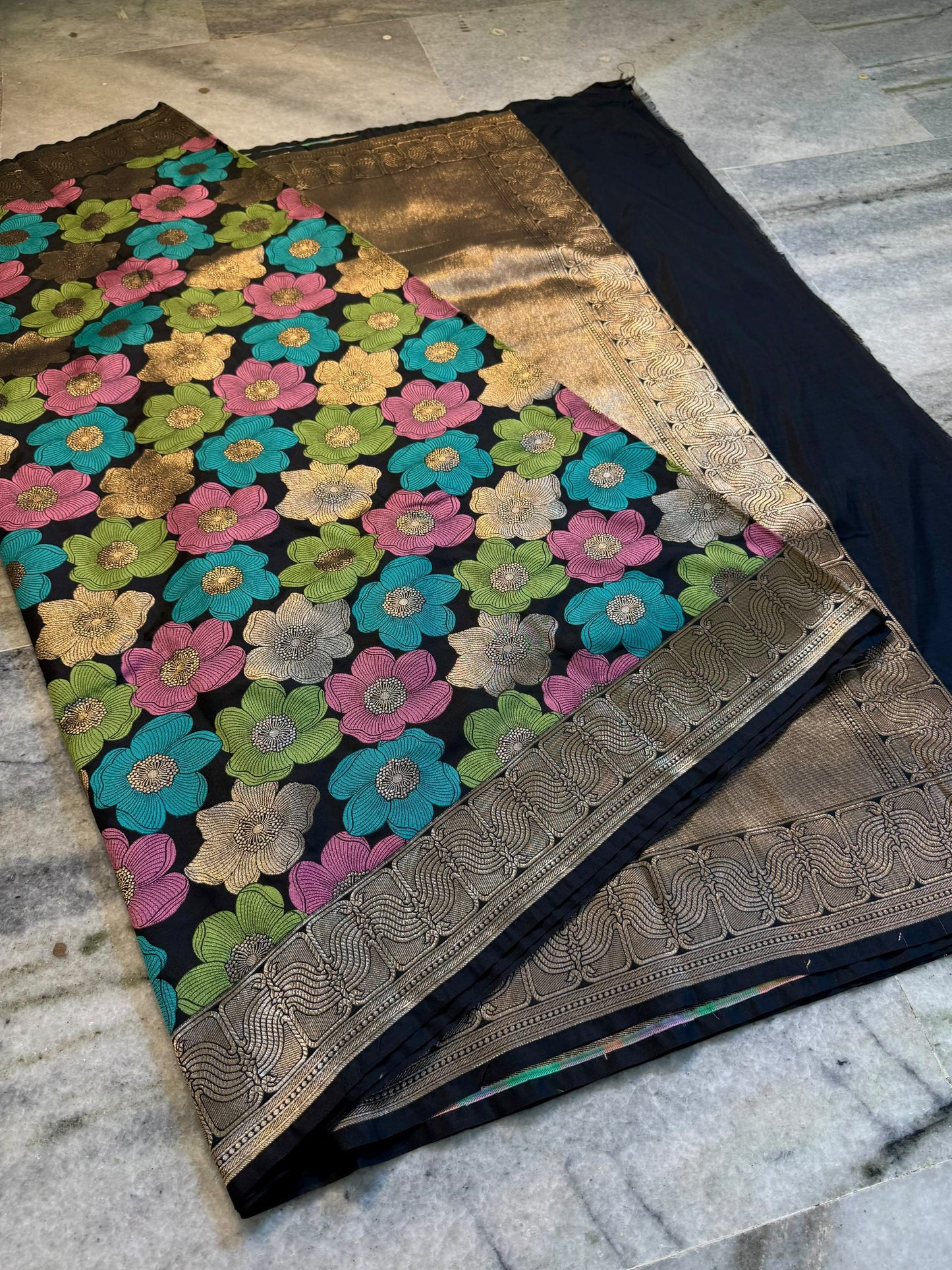 Black Nita Ambani Inspired Mashru Silk Saree with Multicolor Floral Weaving & Antique Gold Zari Border