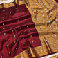 Maroon Tissue Silk Saree with Ghungroo, Mirror & Moti Work | Rich Golden Zari Designer Saree for Wedding & Festive Wear